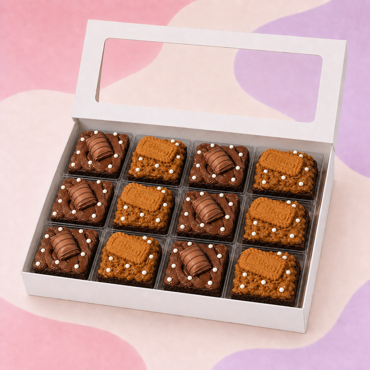 Open white box with twelve BrowniBop Nutella and Cookie Butter brownies in clear inserts